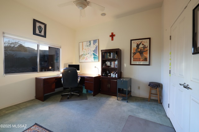 office space with ceiling fan and carpet flooring