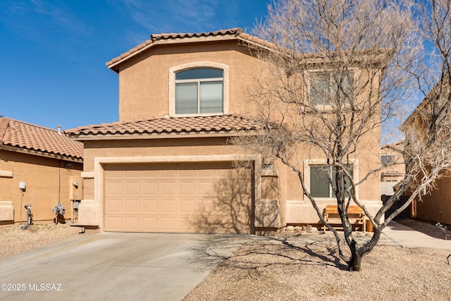 view of front of house featuring stucco siding, concrete driveway, an attached garage, and a tiled roof