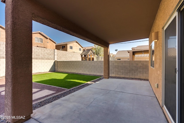 view of patio with a fenced backyard