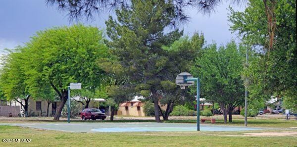 view of home's community featuring a lawn