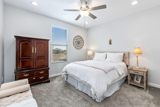 bedroom featuring recessed lighting, baseboards, light colored carpet, and a ceiling fan