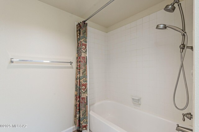 full bathroom with shower / bath combo