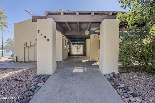 exterior space featuring stucco siding