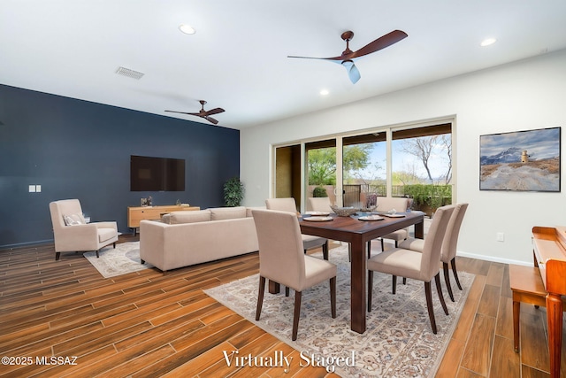 dining room featuring wood finished floors, recessed lighting, a ceiling fan, and visible vents