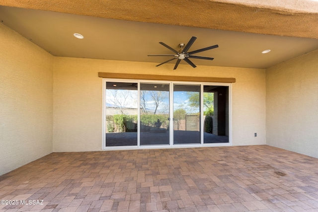 view of patio / terrace featuring a ceiling fan