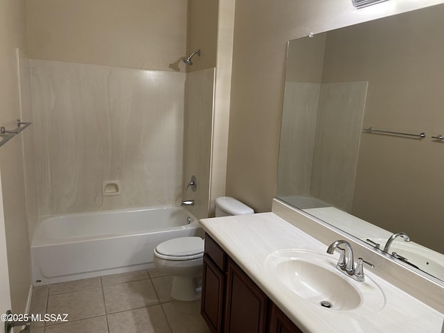 bathroom featuring tile patterned floors, toilet, tub / shower combination, and vanity