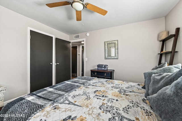 bedroom featuring visible vents and a ceiling fan