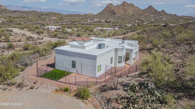 drone / aerial view featuring a mountain view