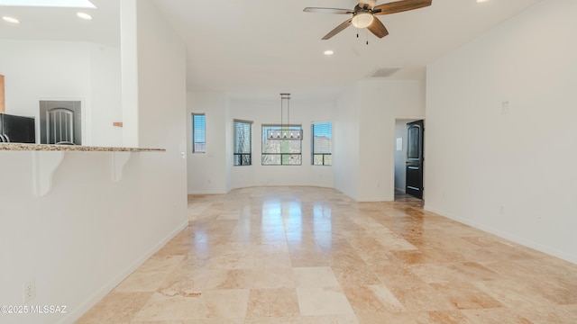 unfurnished living room featuring recessed lighting, visible vents, baseboards, and ceiling fan