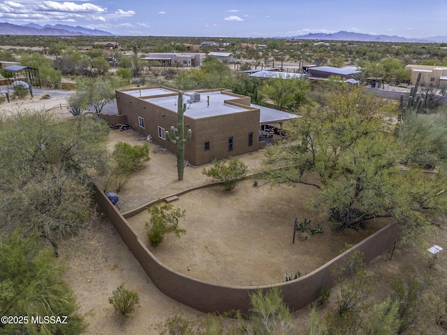 drone / aerial view featuring a mountain view