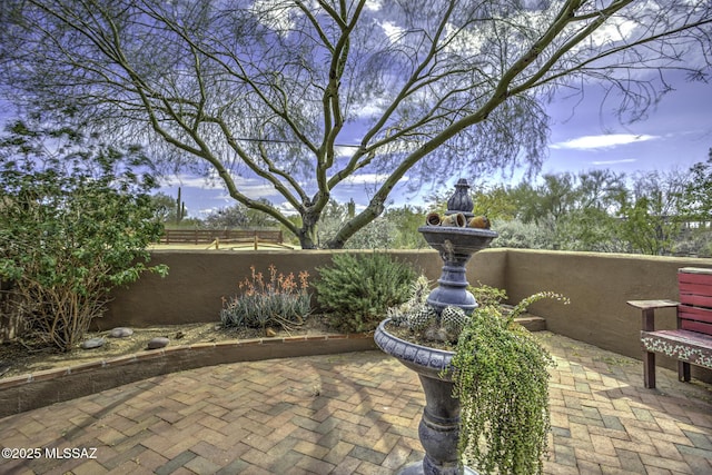 view of patio with fence