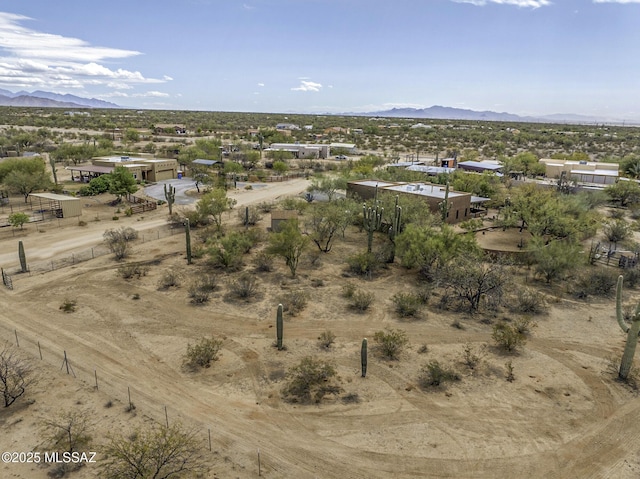 aerial view with view of desert and a mountain view