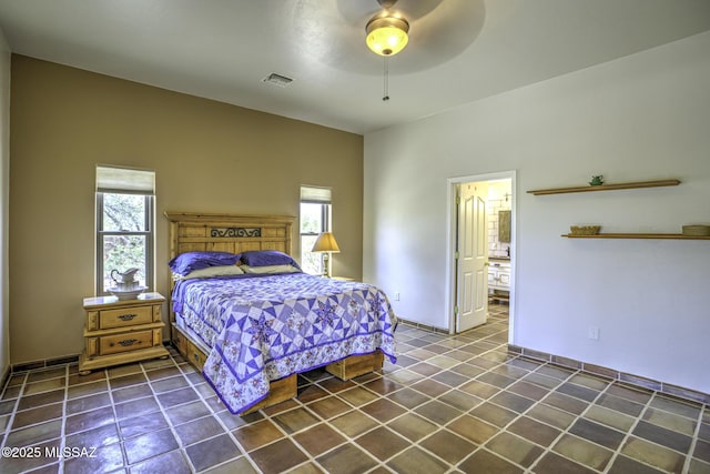 tiled bedroom featuring visible vents and ceiling fan