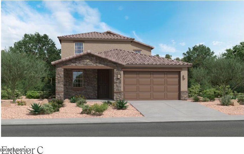 mediterranean / spanish home featuring stone siding, concrete driveway, an attached garage, and a tiled roof