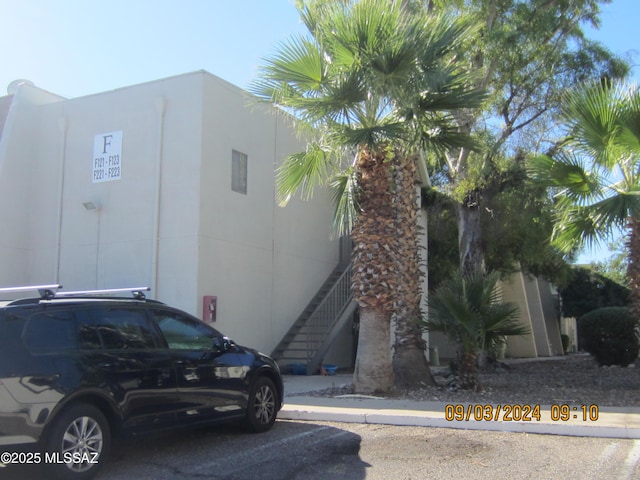 view of home's exterior featuring stairway