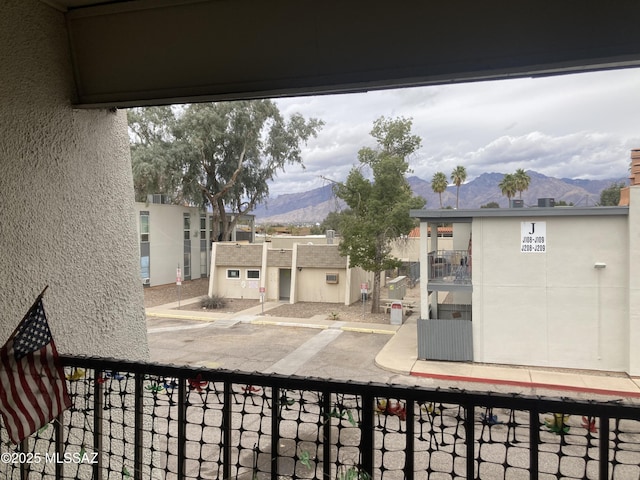 balcony featuring a mountain view