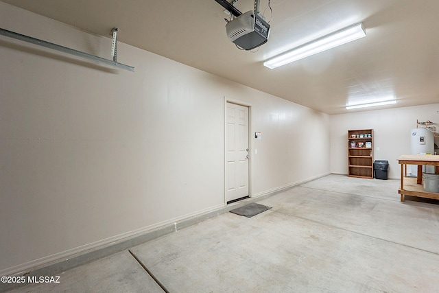 garage featuring water heater, baseboards, and a garage door opener