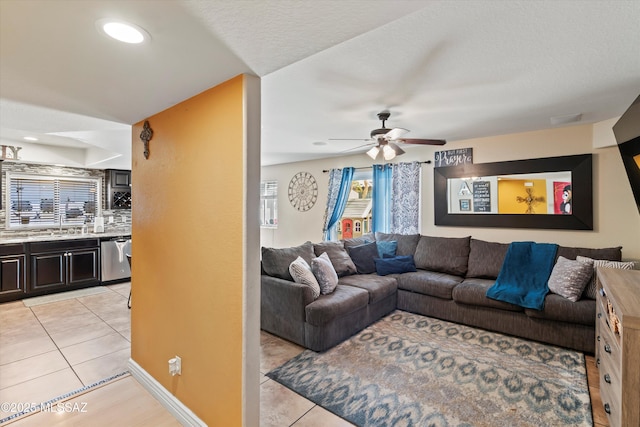 living area featuring visible vents, recessed lighting, light tile patterned floors, baseboards, and ceiling fan