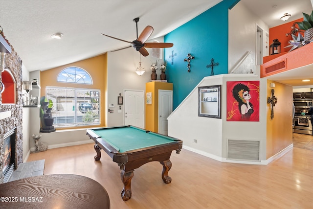 playroom with wood finished floors, visible vents, and ceiling fan