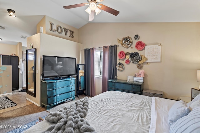 bedroom featuring carpet, vaulted ceiling, a ceiling fan, and visible vents