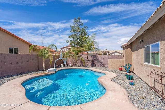 view of pool featuring a fenced in pool and a fenced backyard