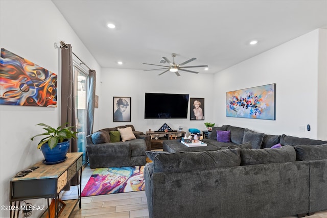 living area with wood finish floors, recessed lighting, and ceiling fan