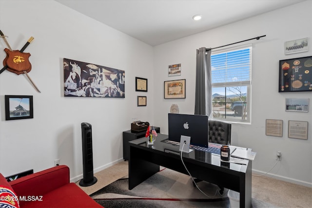 home office featuring carpet flooring and baseboards