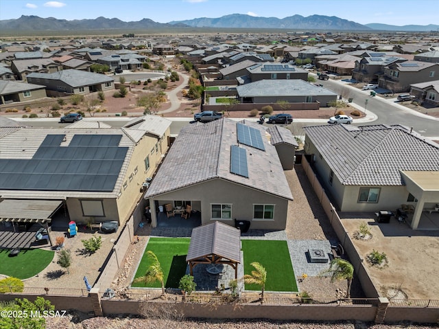 bird's eye view featuring a mountain view and a residential view