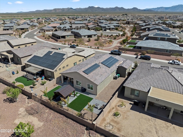 aerial view featuring a mountain view and a residential view