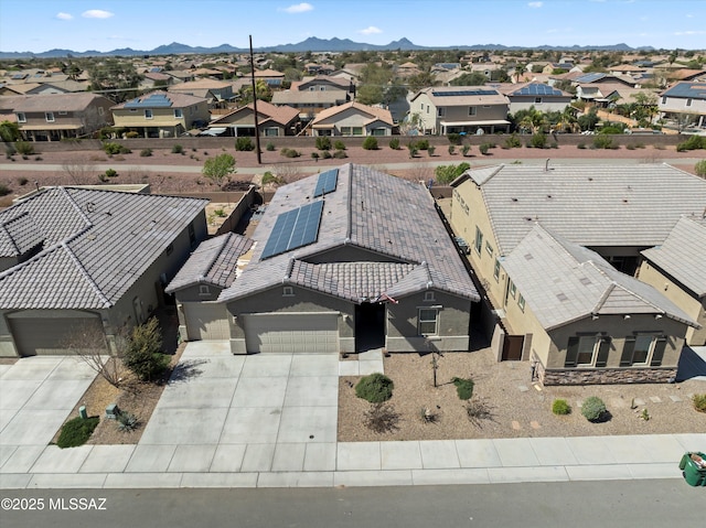 bird's eye view with a mountain view and a residential view