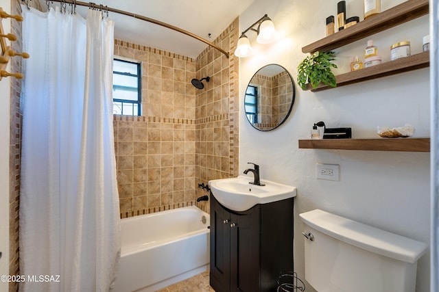 bathroom with vanity, shower / tub combo, and toilet