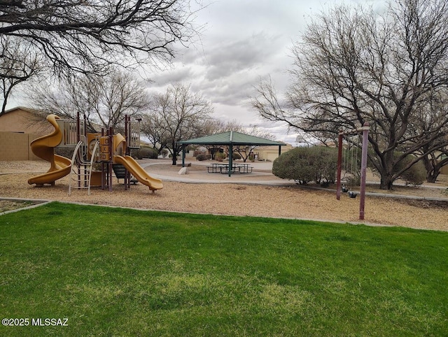 communal playground featuring a gazebo and a lawn