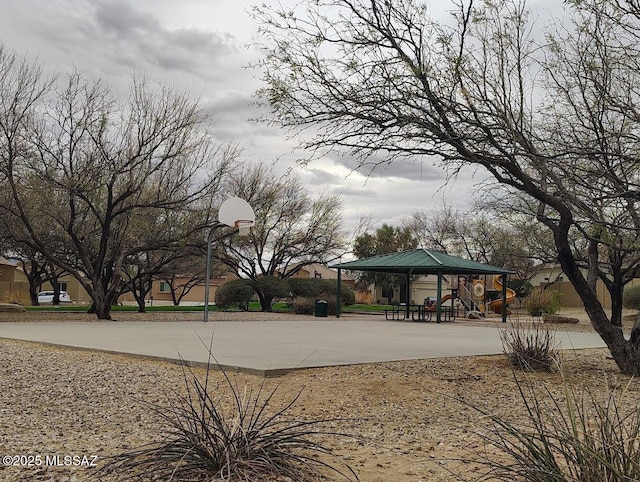 view of home's community with playground community and community basketball court