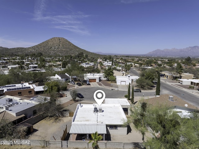 exterior space with a residential view and a mountain view
