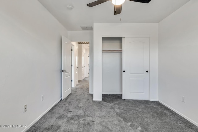 unfurnished bedroom with a closet, baseboards, visible vents, and carpet floors