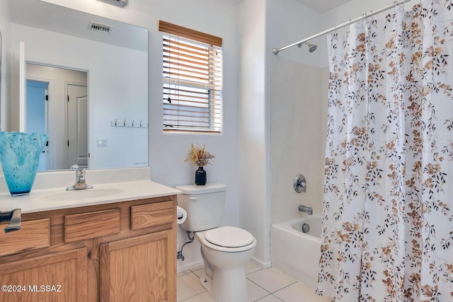 bathroom with tile patterned floors, visible vents, toilet, shower / tub combo, and vanity