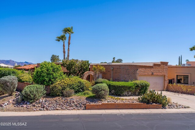 exterior space featuring driveway and a garage