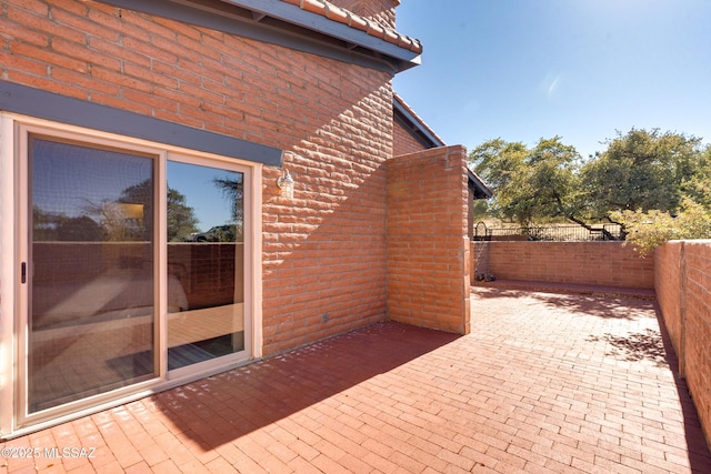 view of patio / terrace with fence