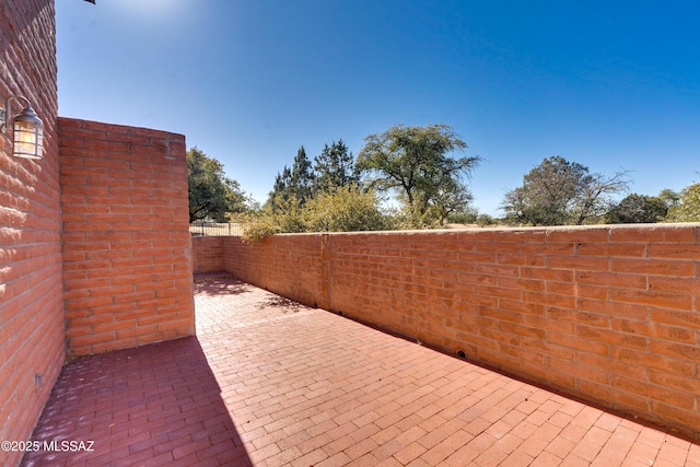 view of patio with fence
