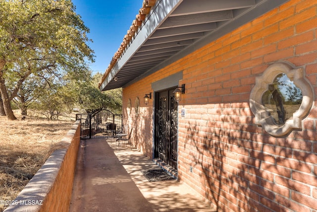 exterior space with a gate