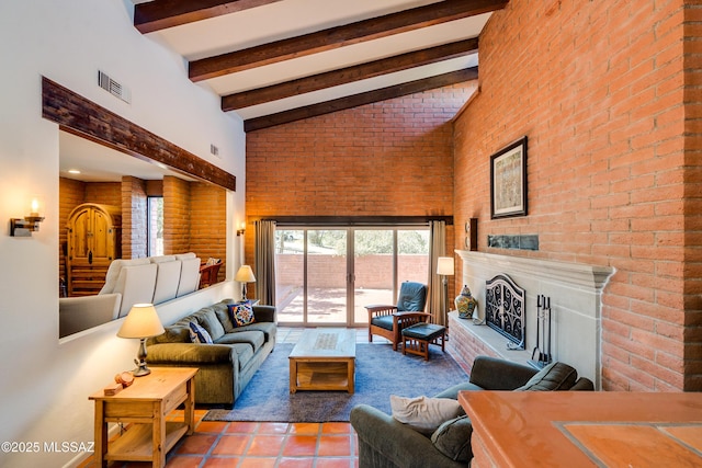 living area featuring tile patterned flooring, visible vents, a fireplace with raised hearth, beamed ceiling, and high vaulted ceiling