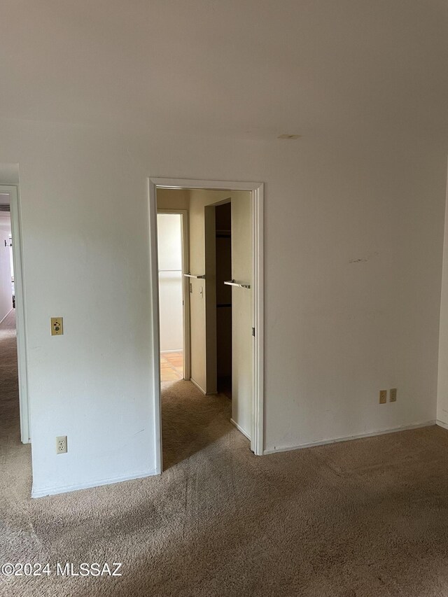 unfurnished bedroom featuring carpet flooring