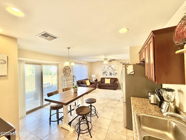dining room with recessed lighting, light tile patterned floors, visible vents, and ceiling fan