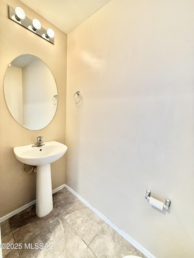 bathroom featuring baseboards