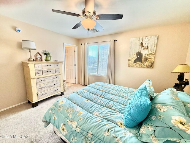 bedroom featuring visible vents, ceiling fan, light carpet, and baseboards