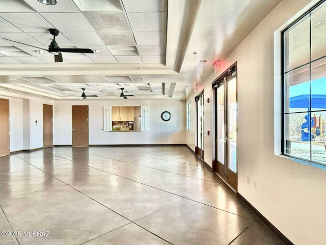 view of basketball court with plenty of natural light