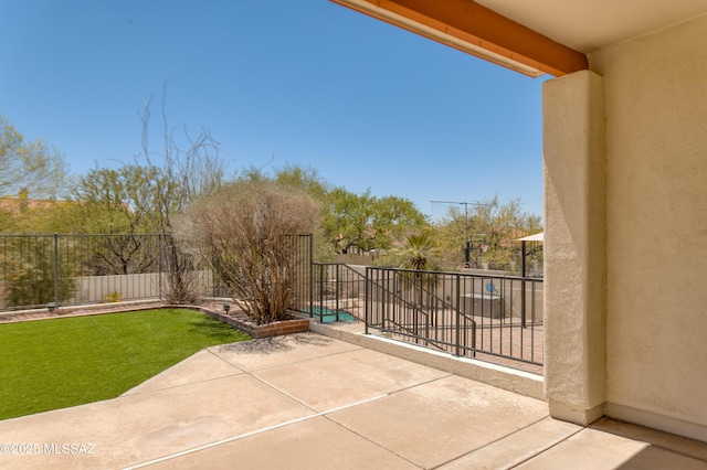 exterior space featuring a fenced backyard