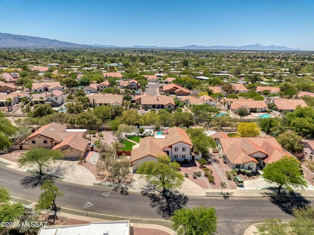 birds eye view of property with a residential view and a mountain view