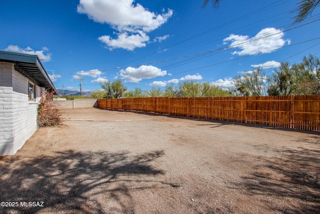 view of yard with fence