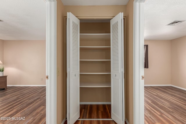 closet featuring visible vents